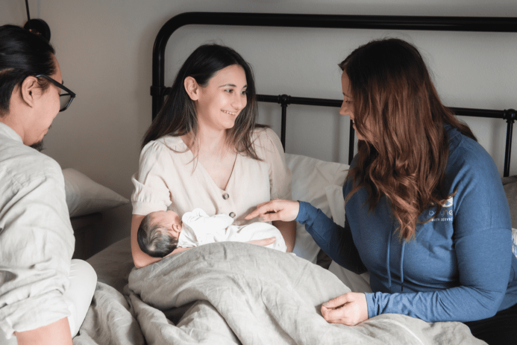 Postpartum doula in Vancouver and Portland helping new parents with newborn.