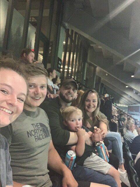 Doula Hannah enjoying quality time with her family, highlighting the importance of balance between work and loved ones.